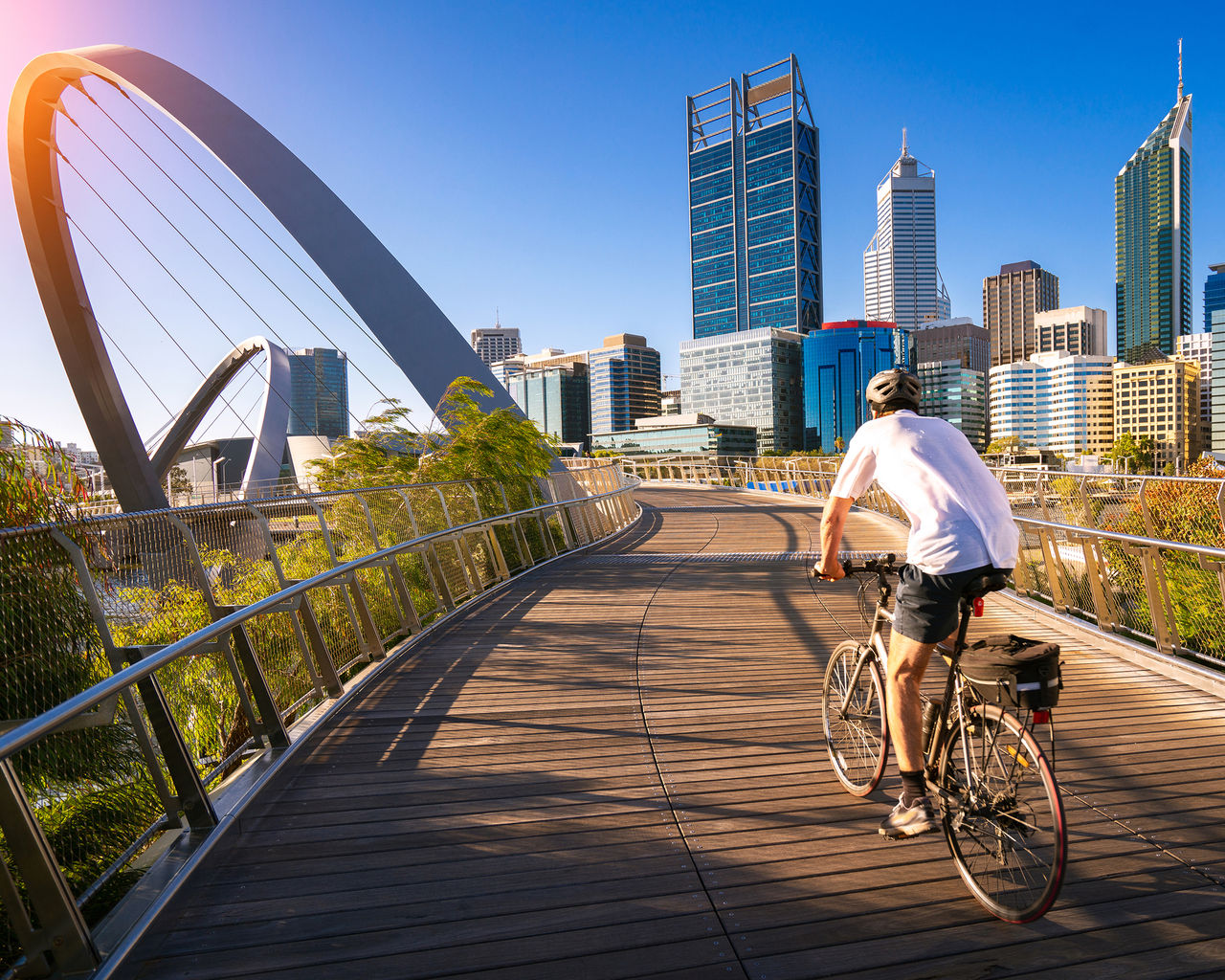 A man cycling on an elizabeth bridge in Perth city, western, Austrakia, this image can use for bike, sport, relax, healthy concept; Shutterstock ID 1334088632; NP: CS-Australia 2026