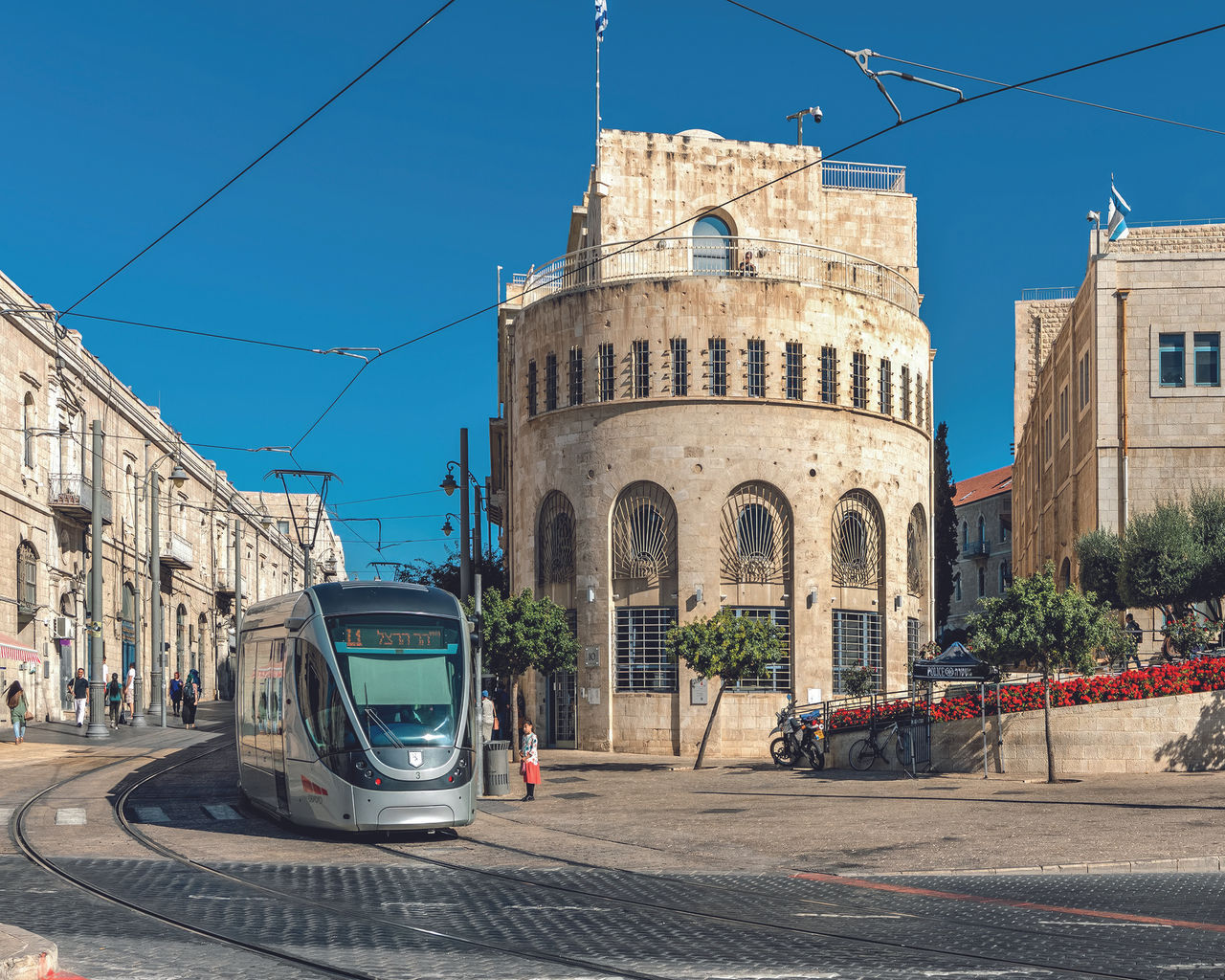 JERUSALEM, ISRAEL - JULY 14, 2019: Modern tram of a light rail system on cobblestone Jaffa street - one of the longest and oldest major streets in Jerusalem, Israel.; Shutterstock ID 2415976299; NP: ECO