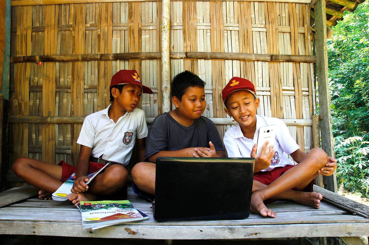 Yogyakarta, Indonesia, March 3, 2021. The atmosphere of children learning together using internet technology.; Shutterstock ID 1958662609; NP: ECO
