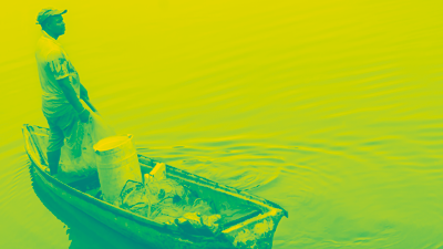 Colombian fisherman alone in a boat